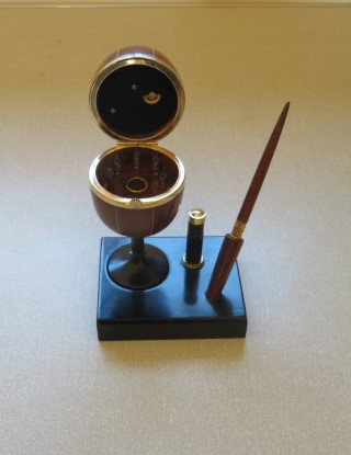 This desk set with dip pen with a collection of nibs and a musical ink well won a turning of the month for Ken Akrill